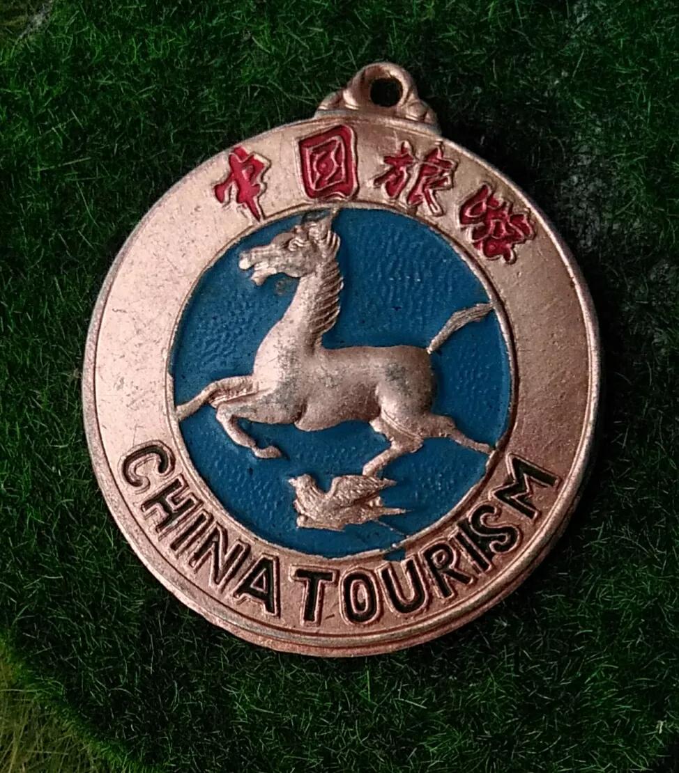 中国旅游日马踏飞燕的由来,什么是马踏飞燕徽标