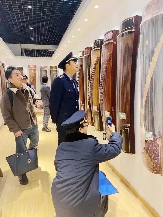 河南假冒的敦煌古筝质量怎么样,敦煌古筝吊牌真假