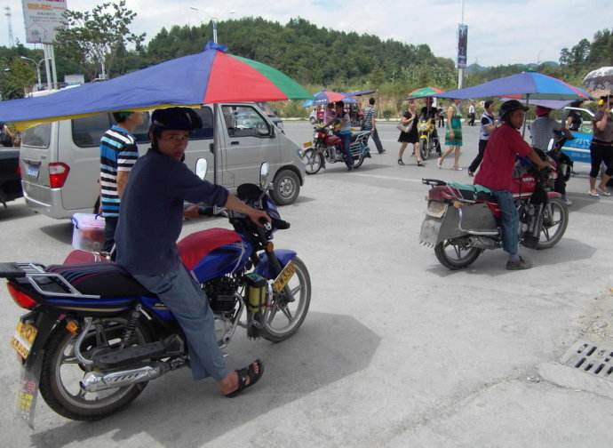 摩的司机打工,摩的拉客一个月能赚多少钱