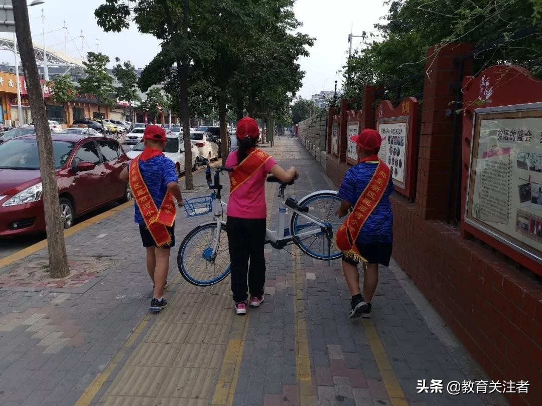 郑州郑东新区昆丽河小学升旗,郑州新区昆丽河小学怎么样