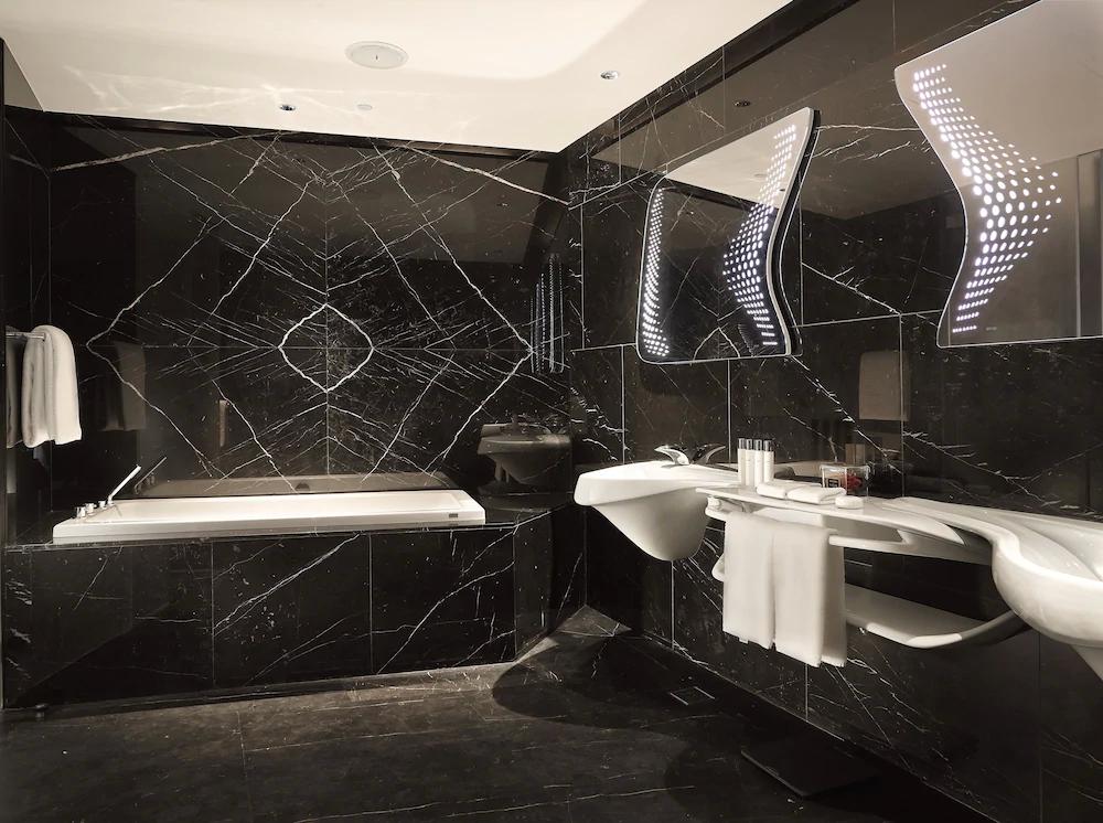 扎哈设计的迪拜酒店,扎哈迪拜综合体图片