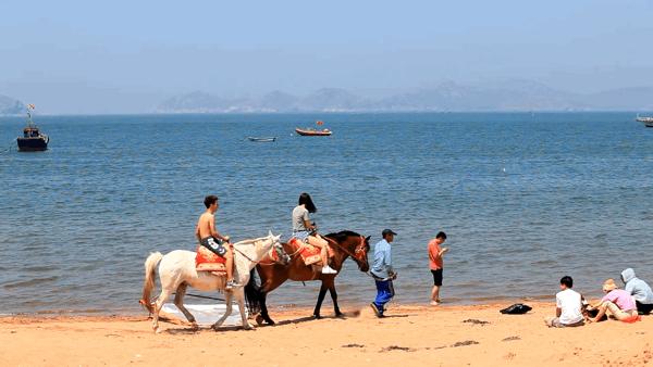大连海滨哪里避暑好,大连必去的海水浴场