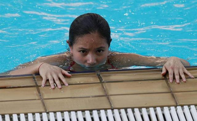 女跳水运动员遇生理期比赛咋办,跳水女运动员生理期还训练吗