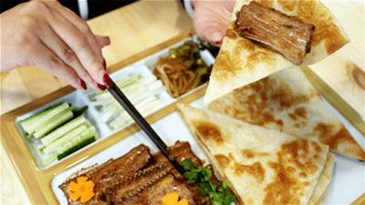 门头沟烧饼夹肘子石门营,门头沟特色小吃烧饼夹肘子