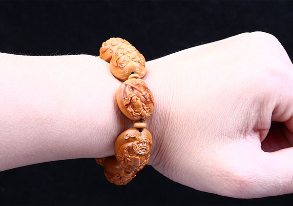 橄榄手串盘花,橄榄核雕手串盘花了怎么办视频