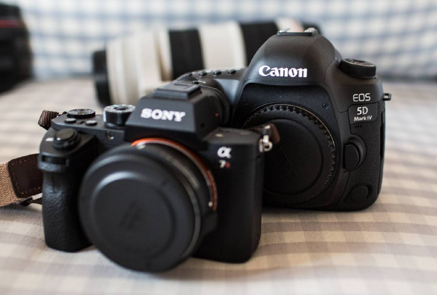 70-200佳能尼康索尼哪个重,佳能单反和索尼单反相比哪个好