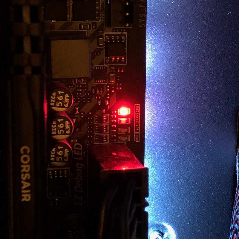 华硕主板debug灯亮是什么原因,主板debug灯亮电源不转