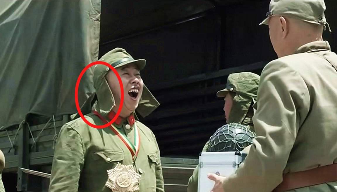 日军帽子上为什么会有一层网,日军帽子为什么有两个帘