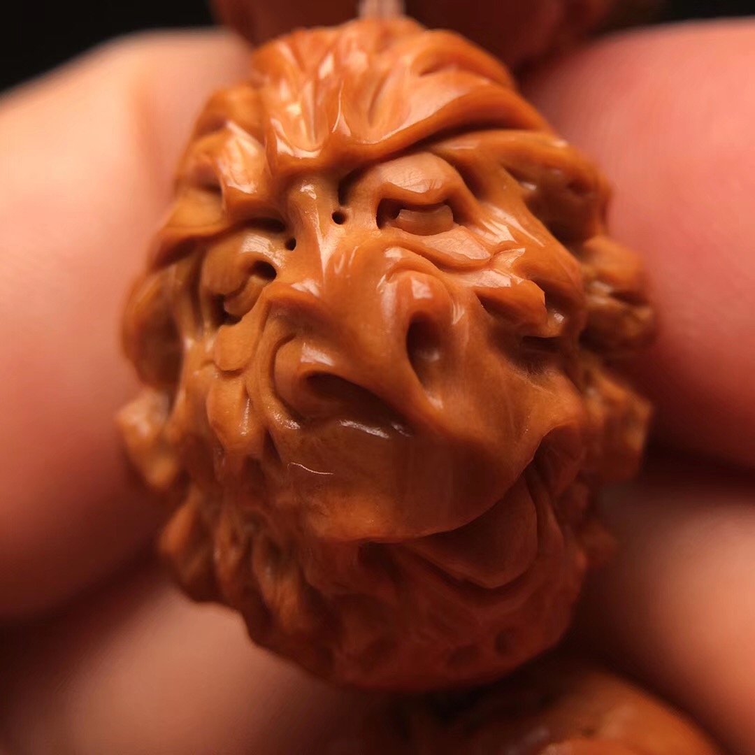 橄榄核十八罗汉手串怎么穿好盘玩,猴头手串和橄榄核手串哪个好盘
