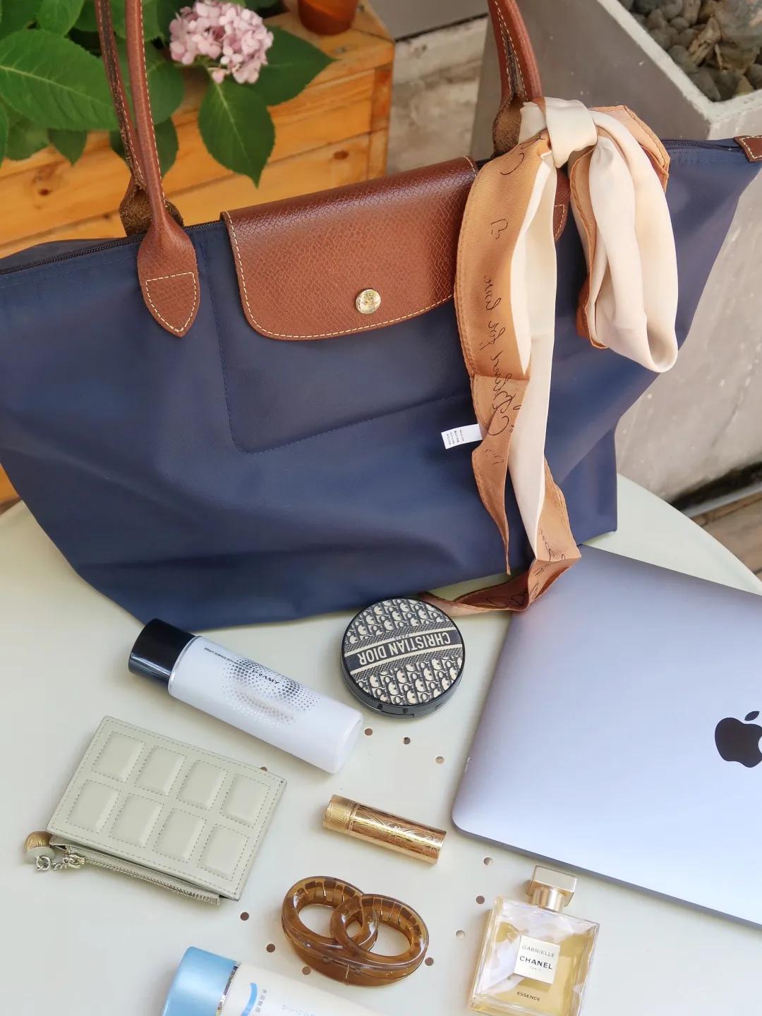 买了一大堆便宜包包,买了一个包回来发现包里有钱