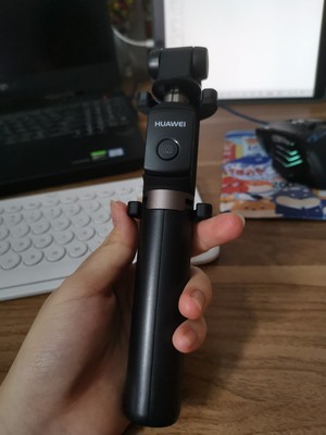 华为有线自拍杆的使用方法及操作,华为手机用自拍杆的使用方法图解
