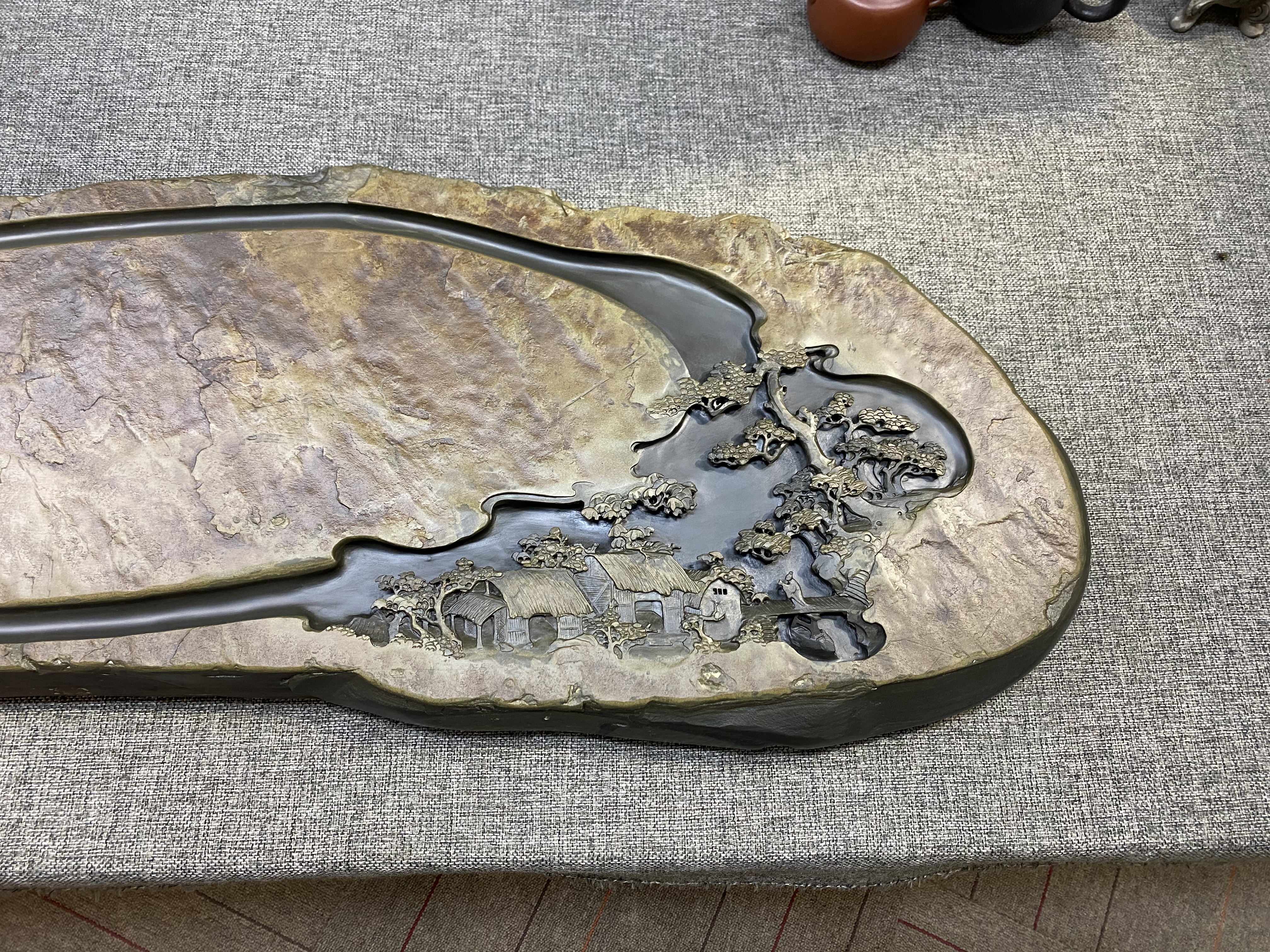 人工雕刻石茶盘,小伙子石头雕刻二十万