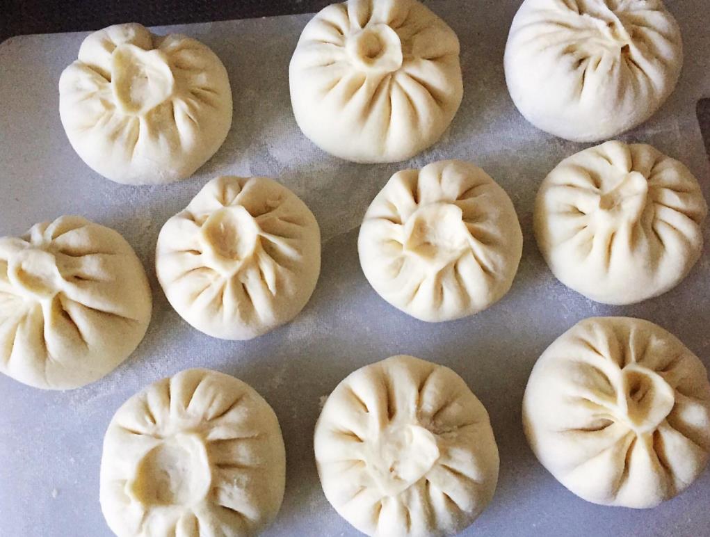 怎么蒸包子不塌陷不回缩,为什么包子出锅后又硬又回缩又黄