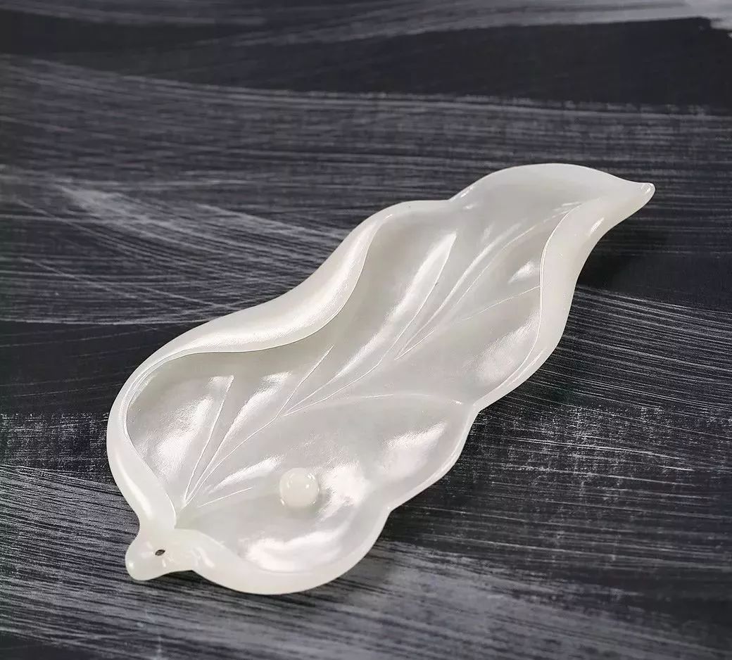 一花一世界一叶一菩提下半句,一花一世界一叶一菩提寓意