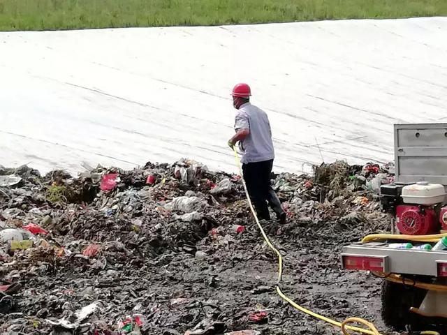 处理生活垃圾看看明港镇咋样“突围”