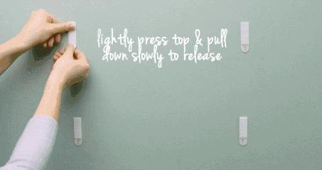 不打孔的挂画,不伤墙面的挂画方法