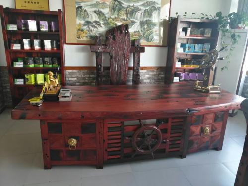 佛山木饰面板酒店装修效果图,木饰面板酒店民宿装修效果图