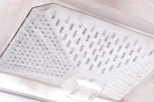 厨房油烟机下面贴油纸,油烟机上面贴纸好清理