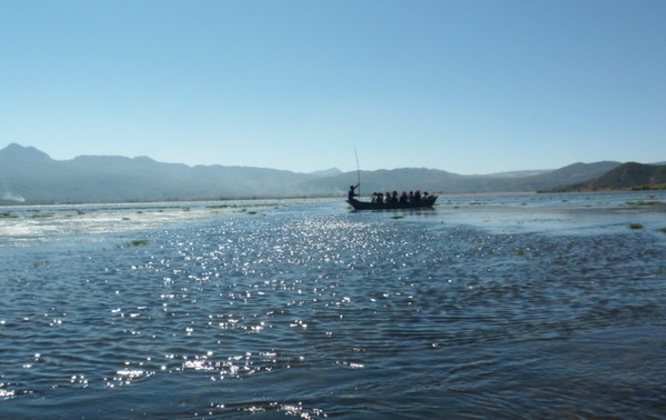丽江可以划船骑马的地方,丽江拉市海骑马划船看雪山