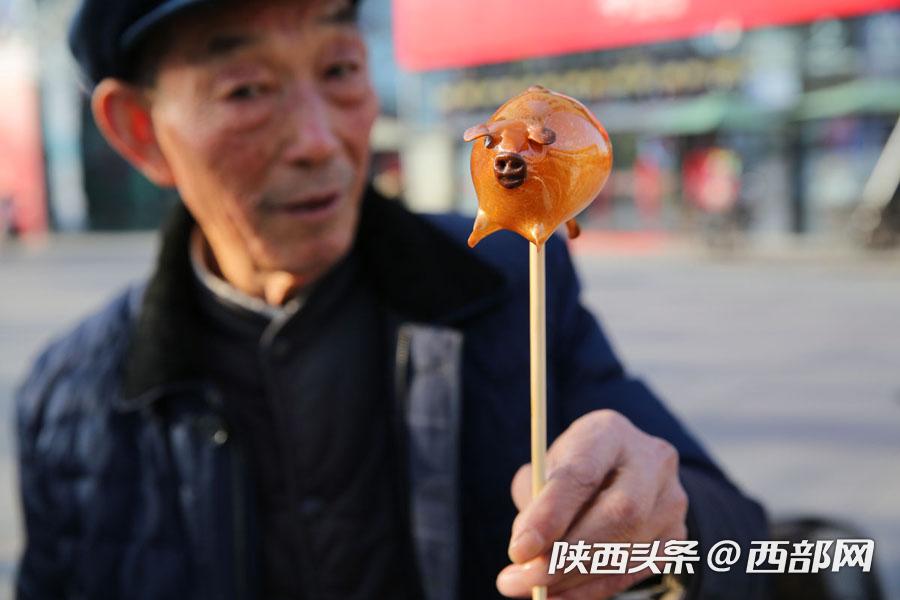 75岁男子吹糖人,75岁老人吹糖人