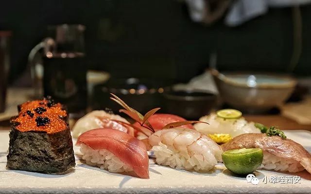 初春的西影厂，是那棵法国梧桐树下的日料店