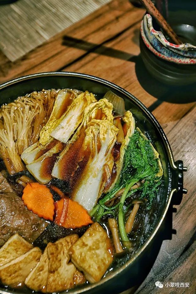 初春的西影厂，是那棵法国梧桐树下的日料店