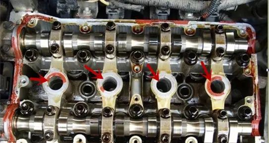 火花塞陶瓷变黄怎么回事,火花塞陶瓷部位变黑是什么原因