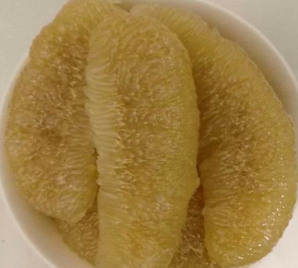 柚子酸到掉牙能吃吗,柚子酸倒牙