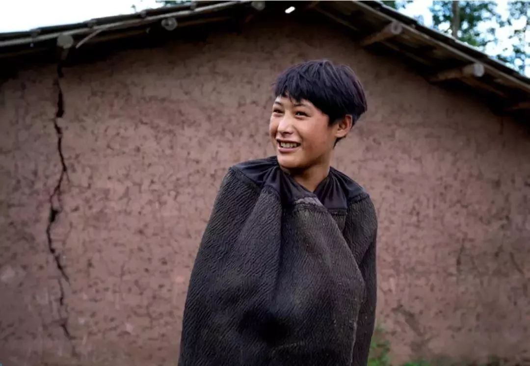 “风”带来了远山的呼唤——《风——在大巴山大凉山中的杨凯生》扶贫摄影展侧记