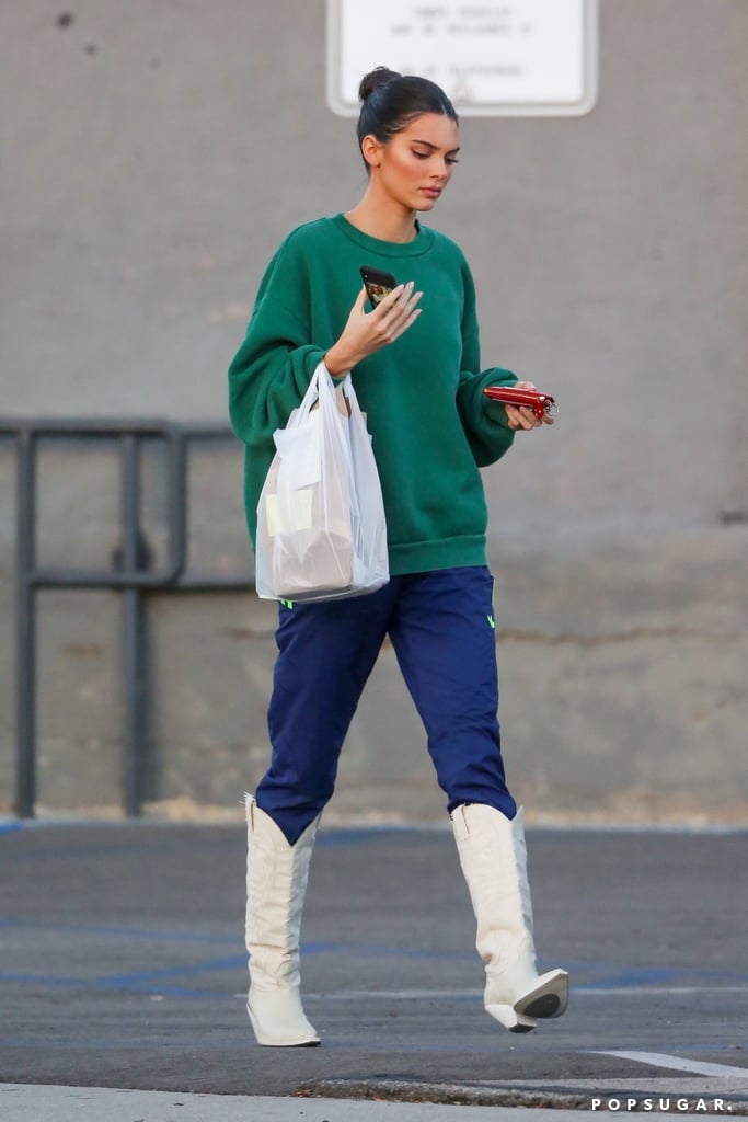 裤筒塞进靴子里的穿搭技巧,肥裤子怎样塞到马丁靴