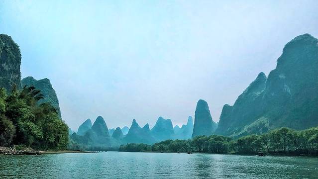 一叶轻舟过烟雨漓江全文,游览阳朔漓江诗词