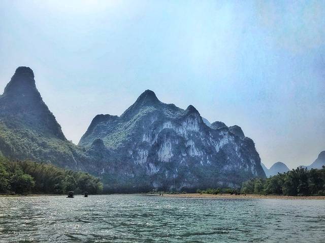 一叶轻舟过烟雨漓江全文,游览阳朔漓江诗词