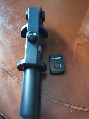 华为有线自拍杆的使用方法及操作,华为手机用自拍杆的使用方法图解