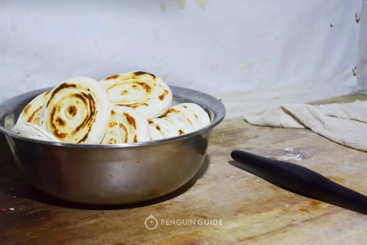 吃西安肉夹馍图片,吃西安肉夹馍视频