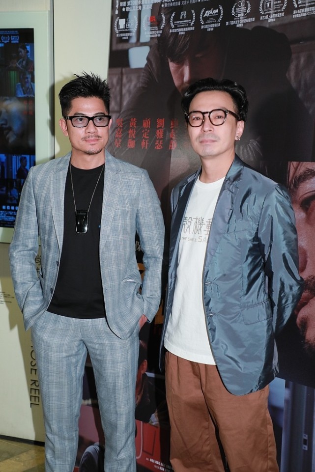 57岁郭富城穿西装笔挺出活动,郭富城双排扣西装搭配