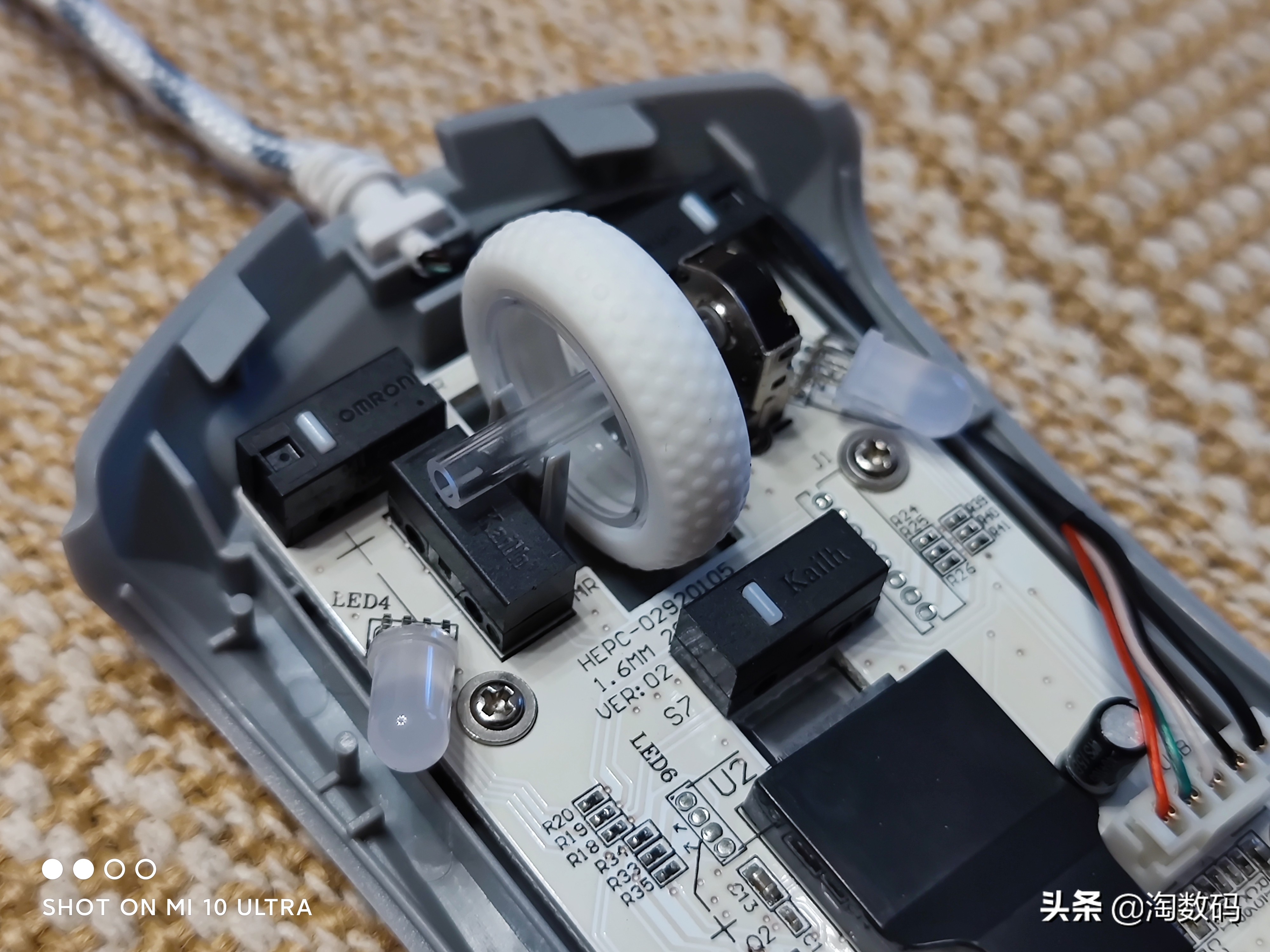 欧姆龙鼠标微动开关盖子如何拆,欧姆龙蓝点微动鼠标