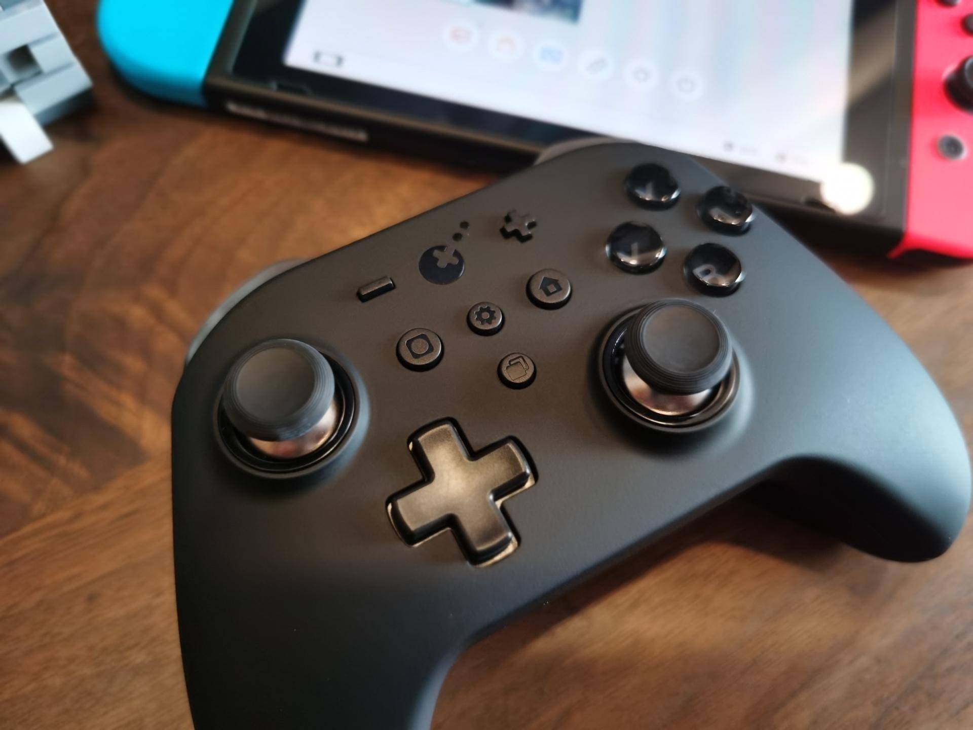 switch手柄对比谷粒金刚手柄,switchpro手柄淘宝200多