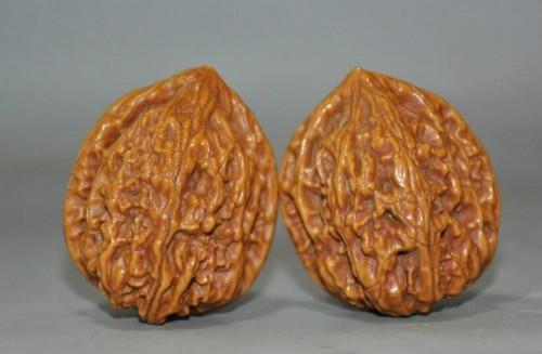 机刷核桃怎么看出是不是药水泡的,机刷核桃和手盘的区别