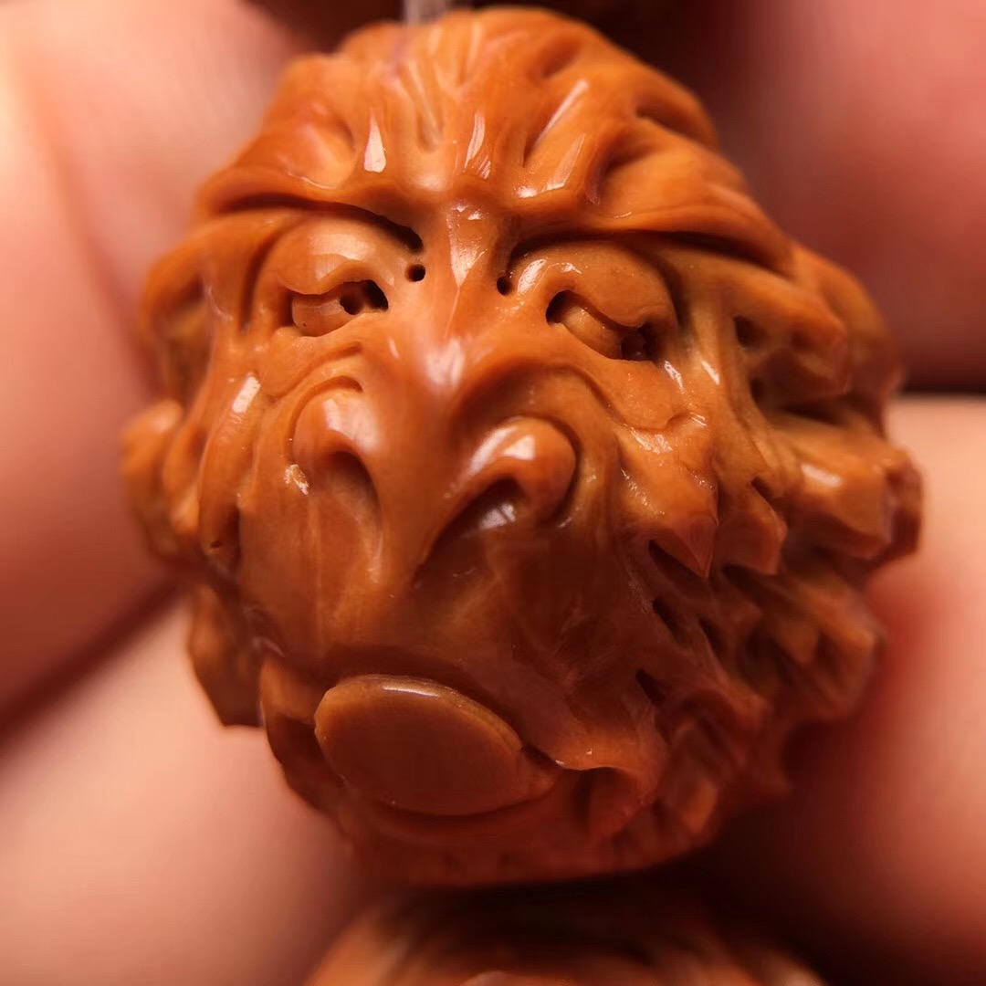 橄榄核十八罗汉手串怎么穿好盘玩,猴头手串和橄榄核手串哪个好盘
