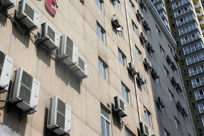 日本人为什么要把空调挂在家里,日本人空调外机不挂墙