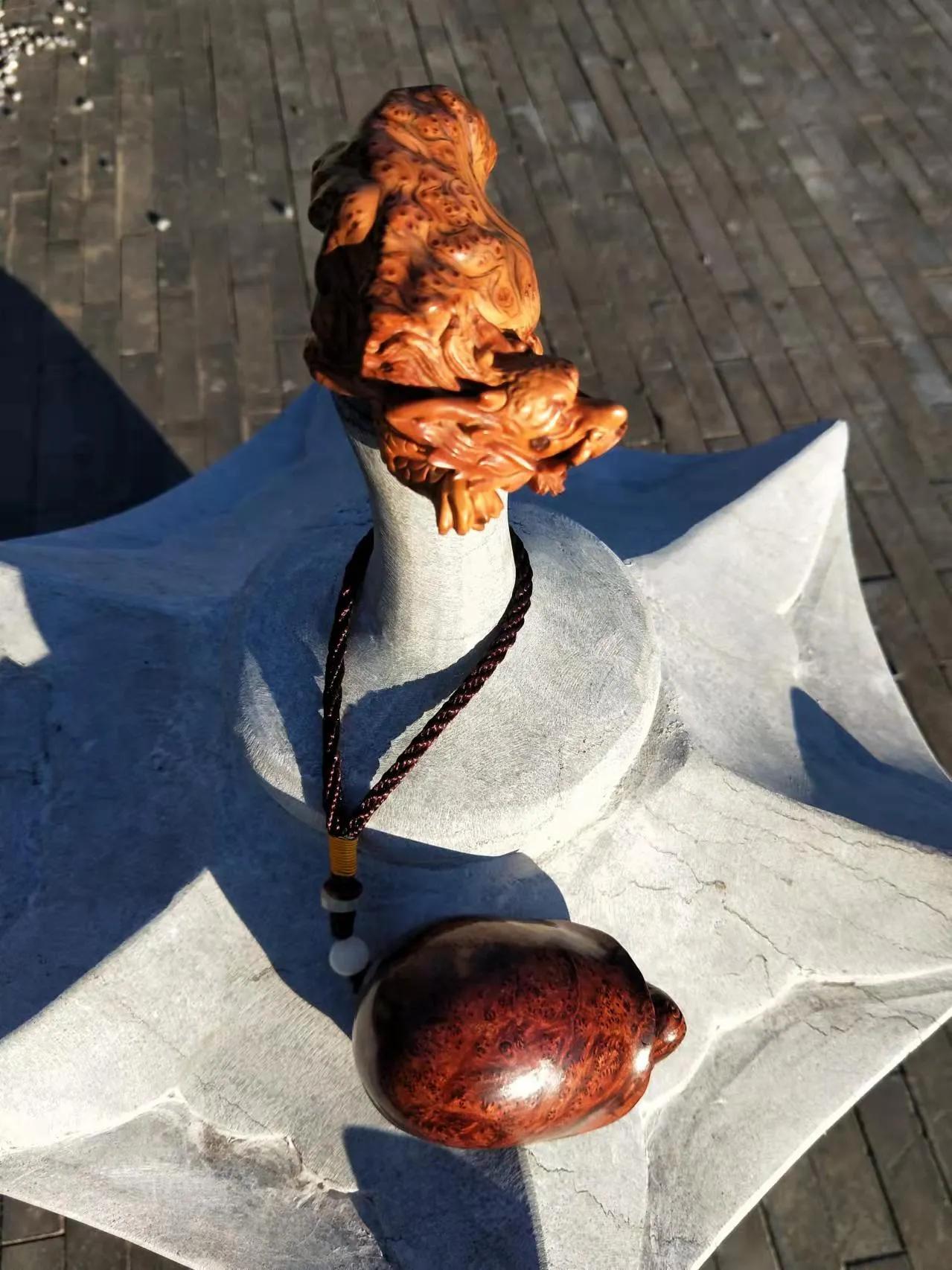 怎么盘玩琥珀木手把件,怎样盘玩榆木把件