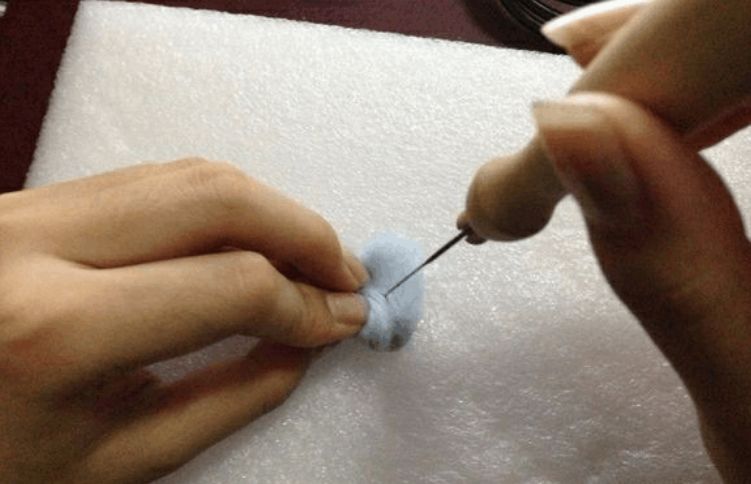羊毛毡温暖手作,羊毛毡怎么在球上戳出爱心