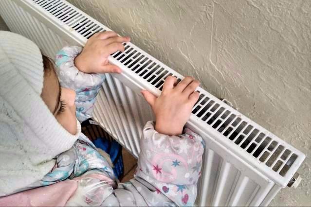 壁挂炉暖气片有水流声怎么解决,暖气片有水流声是什么原因