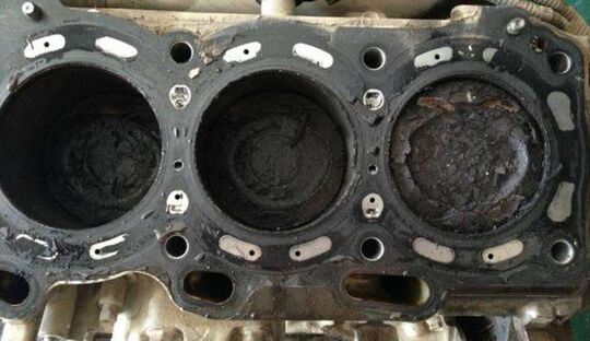 摩托车发动机积碳清洁剂,摩托车火花塞黑色积碳多怎么解决