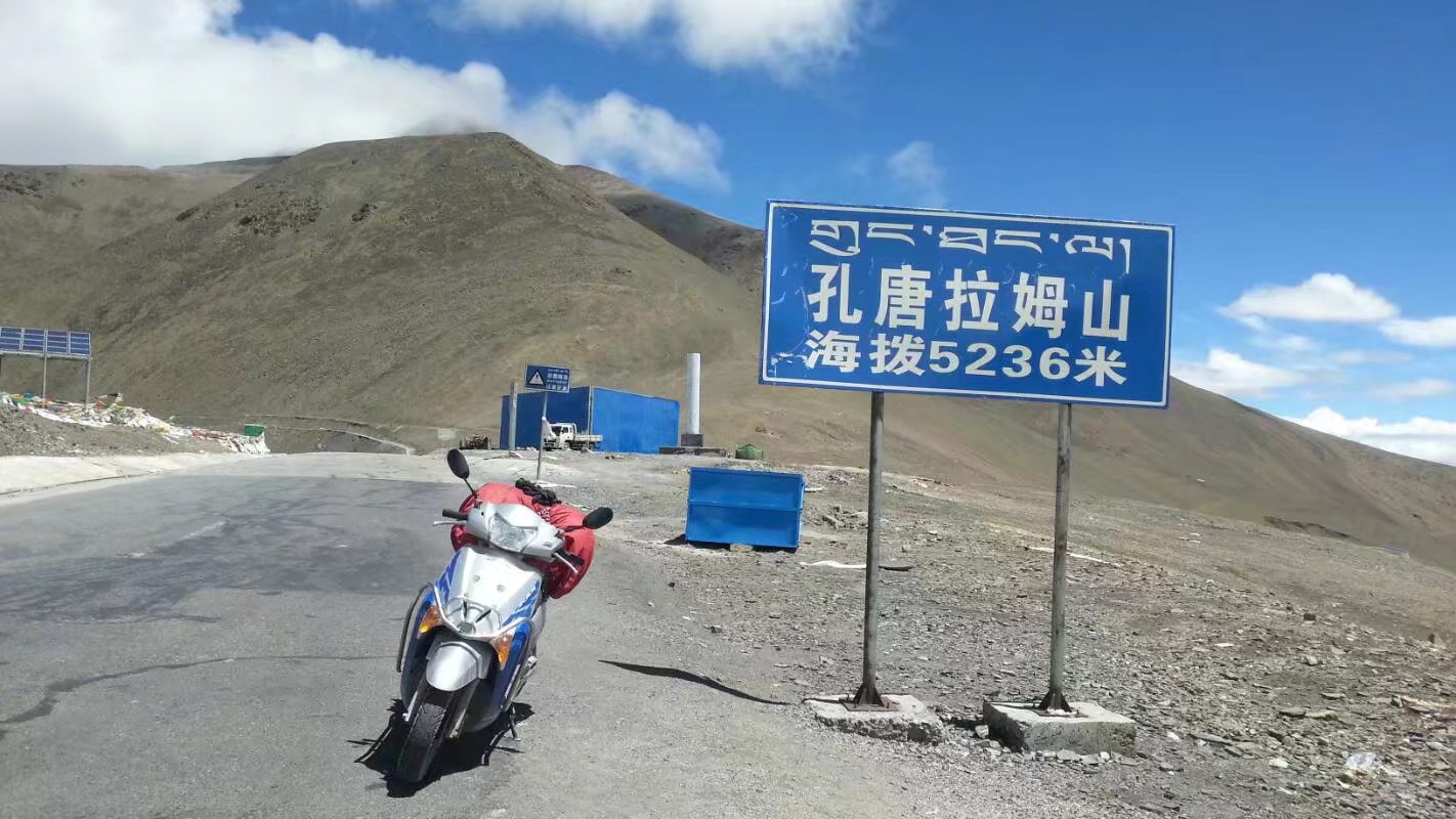 故事:那个骑上摩托去拉萨的姑娘,达成所愿时,是49岁