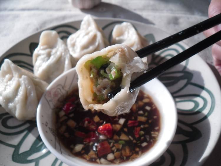 东北人最爱的酸菜肉馅饺子,东北人爱吃什么馅饺子