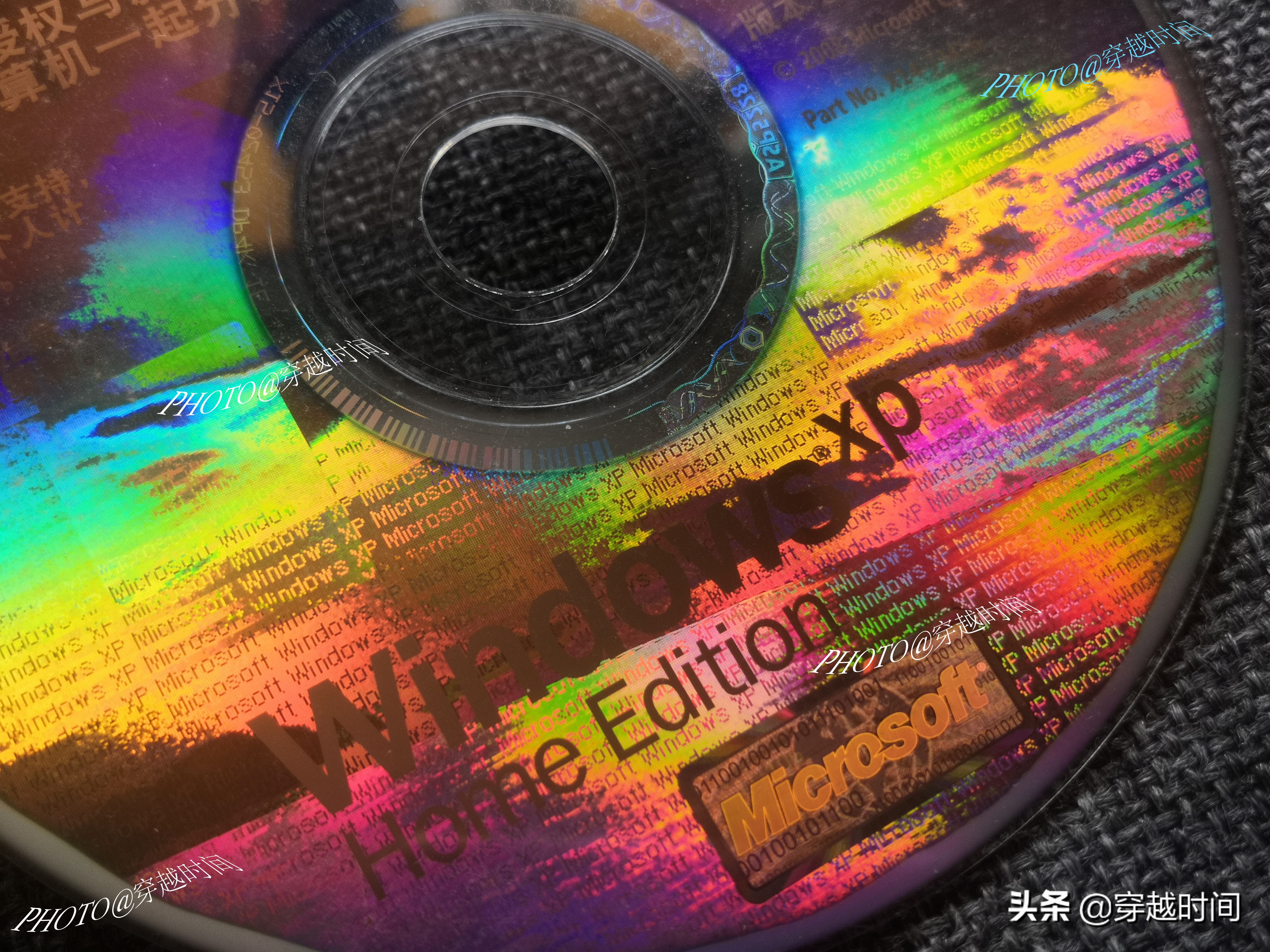 「百年光磁」全息防伪的WindowsXP光盘啥样？缤纷绚丽千变万化