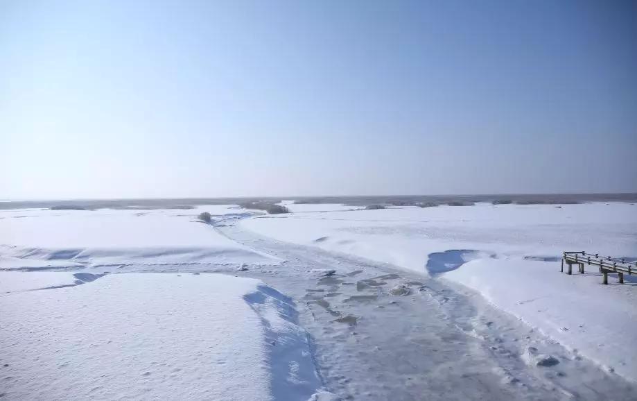 下雪后的海边图片大全,六月份的红海滩
