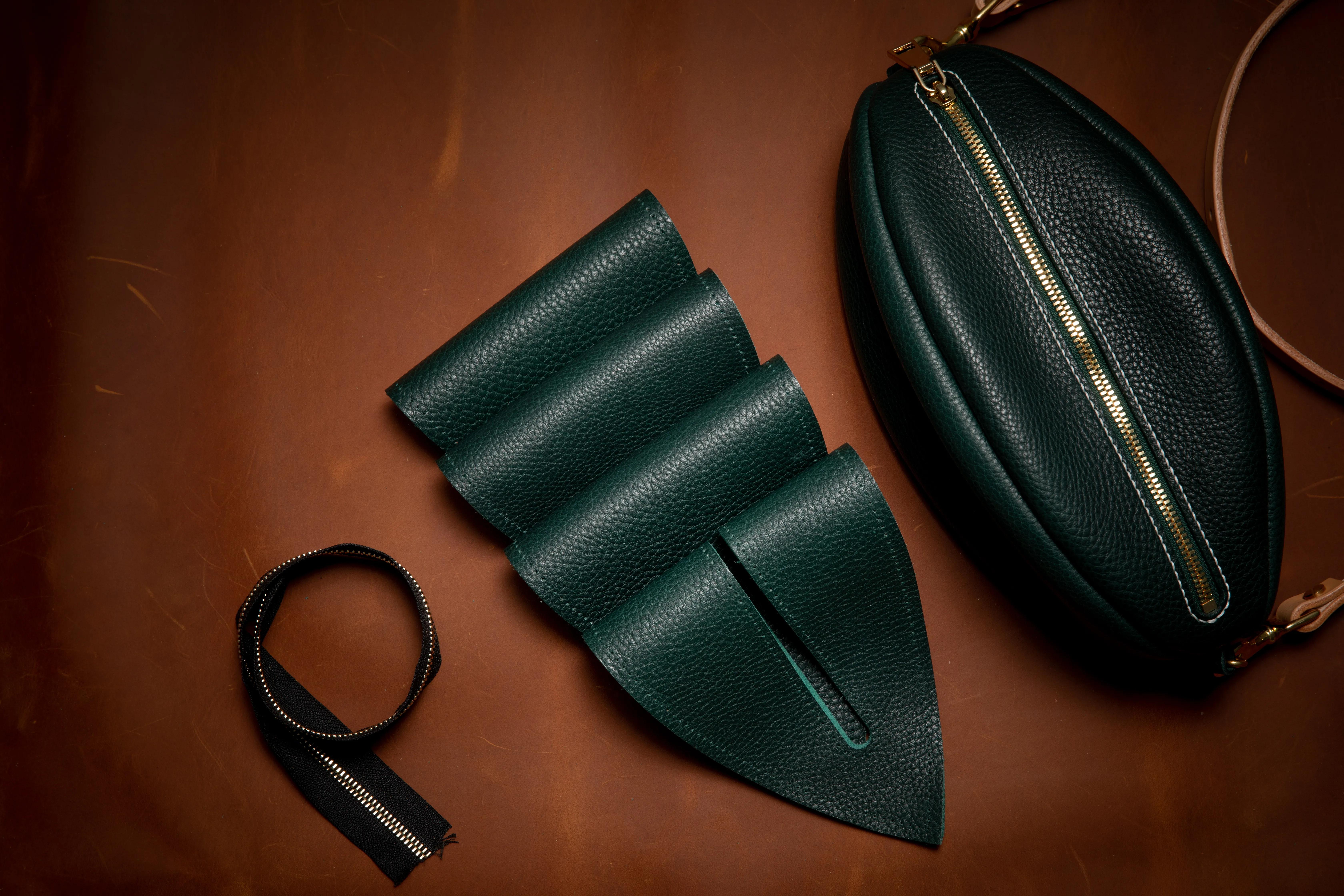 手工皮具橄榄球包制作,橄榄球型包包制作