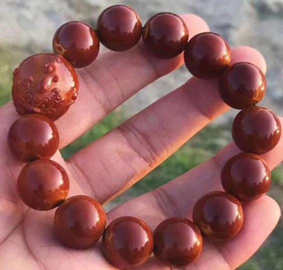 橄榄核正圆光珠孔道不正可以玩吗,橄榄核正圆光珠值得盘吗